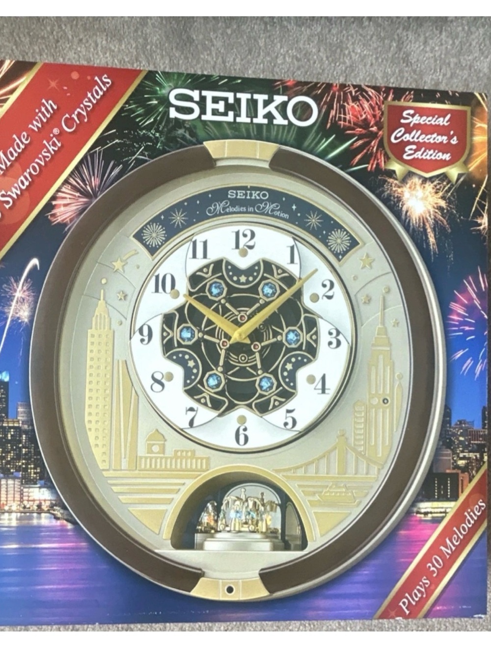 Seiko Gold and White Melodies in Motion Wall Clock